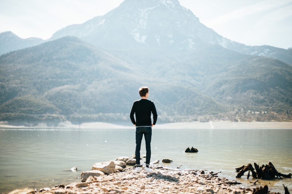 individual standing near water